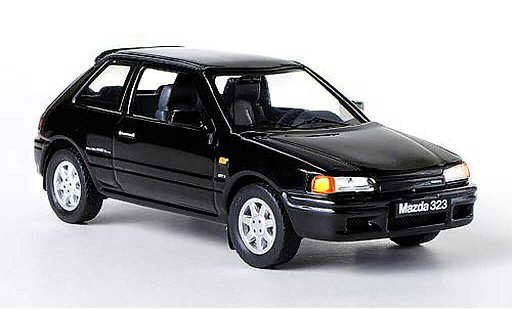 Mazda 323 GTX 1/43 IXO schwarz LHD 1989 modellautos