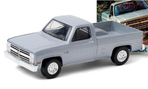 Modellautos Chevrolet Silverado 1/64 Greenlight mettalic grau 1985 Chevrolet Silverado 1/64 Greenlight mettalic grau 1985 modellautos