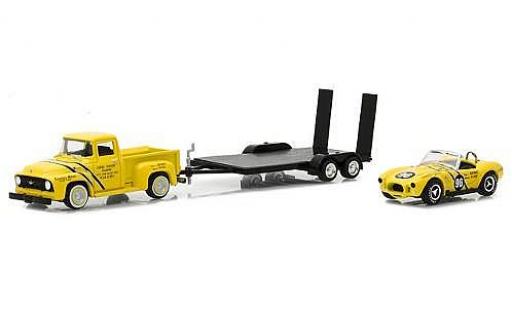 Modellautos Ford F-1 1/64 Greenlight 00 gelb 1954 with Coventry Moteurs 289 Cobra and Flatbed Trailer Ford F-1 1/64 Greenlight 00 gelb 1954 with Coventry Moteurs 289 Cobra and Flatbed Trailer modellautos