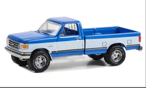 Modellautos Ford F-1 1/64 Greenlight 50 XLT Lariat metallise bleu/blanche 1988 Ford F-1 1/64 Greenlight 50 XLT Lariat metallise bleu/blanche 1988 modellautos