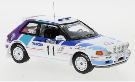Modellautos Mazda 323 1/43 IXO GTX No.11 Rally Team Europe 1000 Lakes Rallye 1990 with night lights H.Mikkola/A.Hertz Mazda 323 1/43 IXO GTX No.11 Rally Team Europe 1000 Lakes Rallye 1990 with night lights H.Mikkola/A.Hertz modellautos