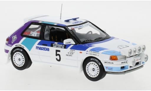 Modellautos Mazda 323 1/43 IXO GTX No.5 Rally Team Europe 1000 Lakes Rallye 1990 with night lights T.Salonen/V.Silander Mazda 323 1/43 IXO GTX No.5 Rally Team Europe 1000 Lakes Rallye 1990 with night lights T.Salonen/V.Silander modellautos