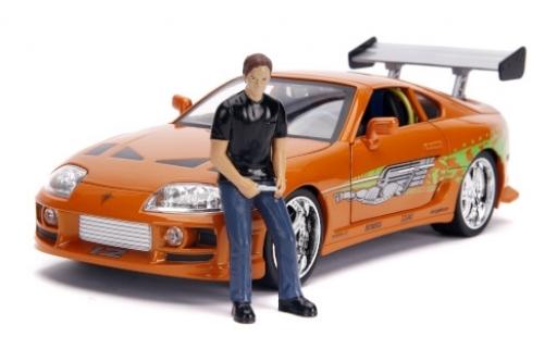 Toyota Supra 1/18 Jada Toys mettalic orange/Dekor Fast & Furious 1995 avec figurine et Scheinwerferfunktion modellautos