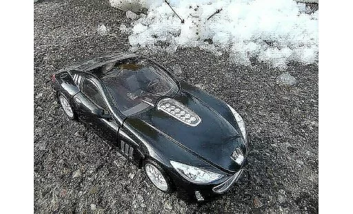 Peugeot 907 Concept 1/18 Burago car 2004 modellautos