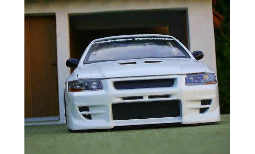 Mitsubishi Lancer Evolution VII 1/18 Ertl tuning modellautos