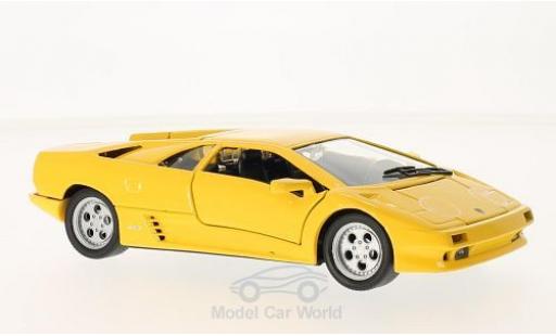 Lamborghini Diablo 1/24 Welly gelb 1998 ohne Vitrine modellautos