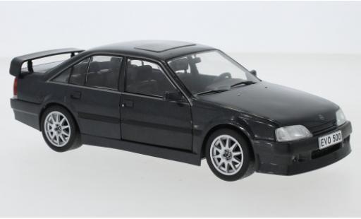 Opel Omega 1/24 WhiteBox Evolution 500 schwarz 1991 modellautos